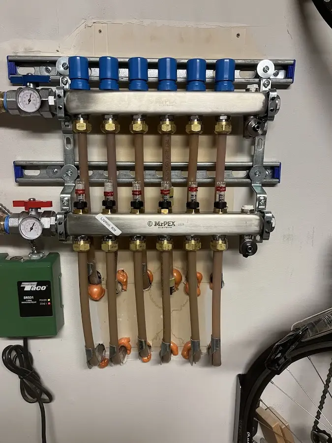 Plumber performing Water Heater Repair at a residential property in Dallas